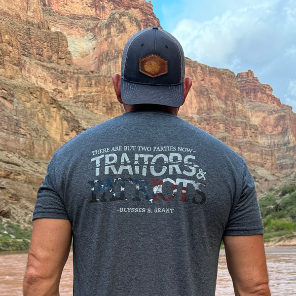 man with USA made patriot shirt with quote on the back, there are but two parties now "Traitors and Patriots