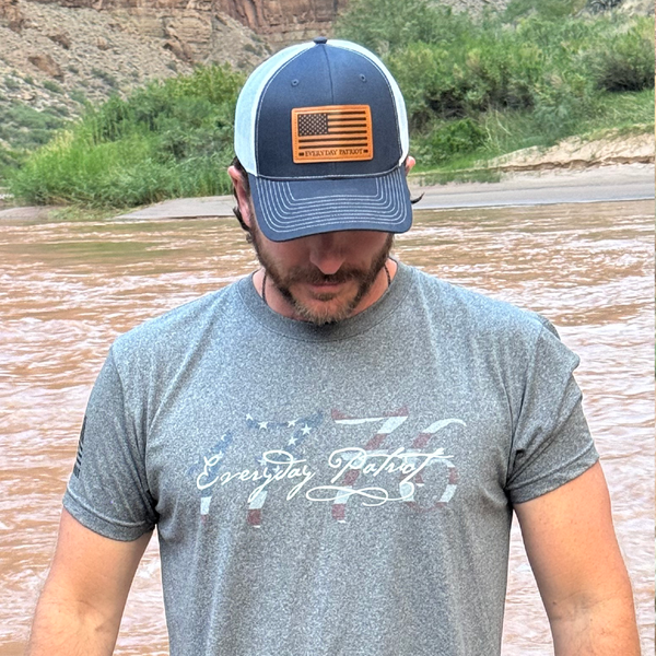 man wearing SA made patriot shirt with 1776 text filled with American flag and Everyday Patriot written over it