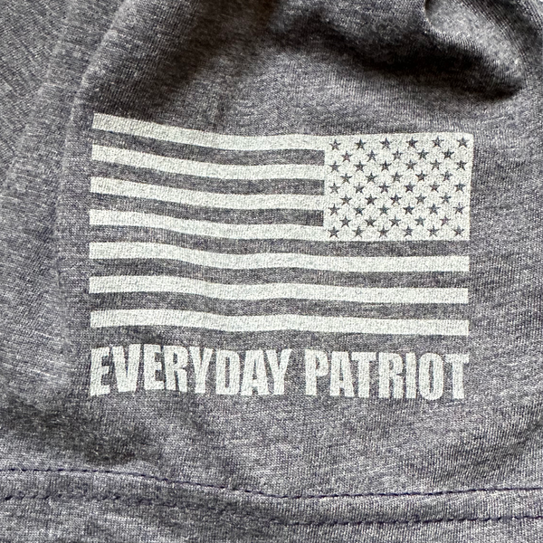 flag with Everyday Patriot under it on the sleeve of the shirt